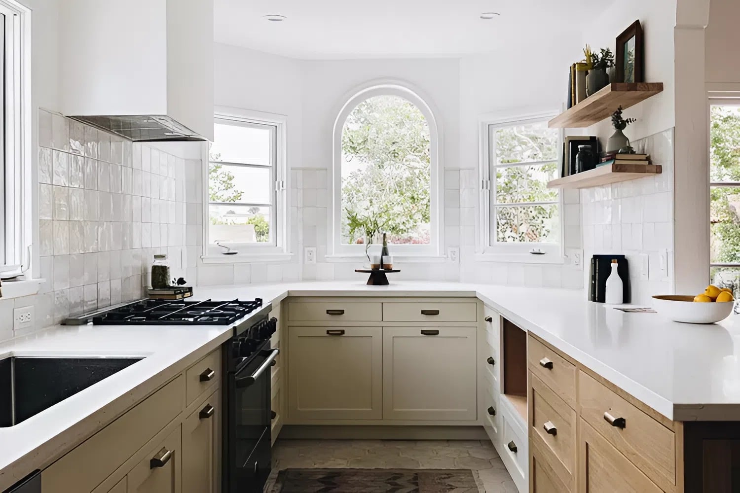 Two-tone cabinets with soft beige and natural wood finishes, painted by a cabinet painter in Hopkinton, MA