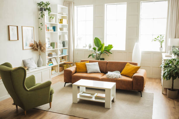 Smoothly painted living room walls with crisp white trim, clean architectural details by a painting company in Wellesley, MA