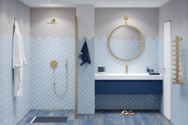 Bathroom with light blue paint colors, white trim, and clean finishes by an interior painter in Milton, MA.